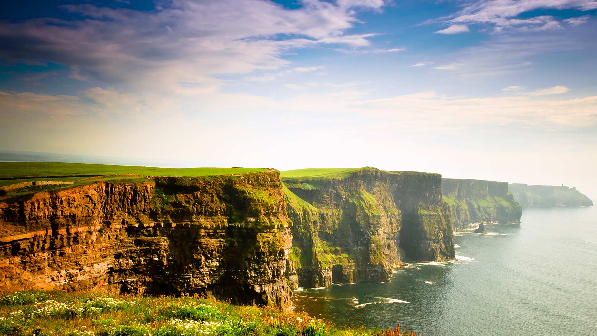 cliffs of moher under cloudy sky ireland